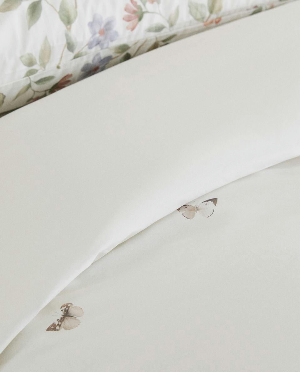 FUNDA NÓRDICA ESTAMPADA DE FLORES Y MARIPOSAS 